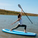 sup yoga on a yoga paddle board