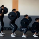 Performing weighted jump squats and deadlift without barbell