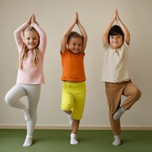 Kids doing yoga and enjoying the benefits of yoga children